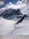 Incredible snow covered mountain scenery on top of the mount Jungfrau in Switzerland 5.6.2015 Royalty Free Stock Photo