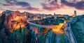 Incredible spring dawn on Gravina in Puglia tovn. Wonderful morning landscape of Apulia, Italy, Europe.