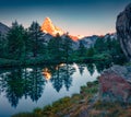 Incredible summer view of Grindjisee lake with Matterhorn peak reflections in watter.