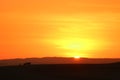 Incredible sunset over the sand dunes of Huacachina desert with the silhouette of tourists dune buggy, Ica region, Peru Royalty Free Stock Photo