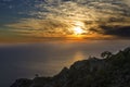 Incredible Turkey, the sunset over the sea, in the sky amazing clouds and an unusual picture of them, in the foreground the road l