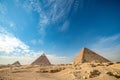 Incredible view of the complex of ancient pyramids against the background of the incredible sky on a hot day Royalty Free Stock Photo