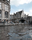 An incredible view on a crowded embankment of a fairytale Gent, Belgium from a canal Royalty Free Stock Photo