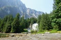 An incredible view of princess louisa inlet and chatterbox falls, with a huge waterfall and giant cliffs in the background