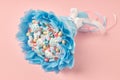 Incredibly beautiful bouquet of multi-colored marshmallows, sweets, decorated with chocolate on a pink background Royalty Free Stock Photo