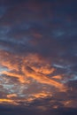 Incredibly beautiful evening sky after sunset with orange and purple clouds.