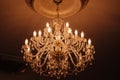 An incredibly beautiful large chandelier hanging in the hall Royalty Free Stock Photo