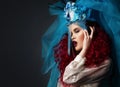 Incredibly fashion girl with red hair in crown and veil Royalty Free Stock Photo