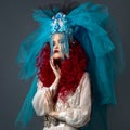 Incredibly fashion girl with red hair in crown and veil Royalty Free Stock Photo