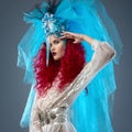 Incredibly fashion girl with red hair in crown and veil Royalty Free Stock Photo