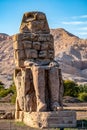 Incredibly magnificent and ancient statues of Colossi on the west bank of the Nile. Colossi Memnon Royalty Free Stock Photo