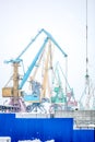 Indastrial crane in cargo port at winter