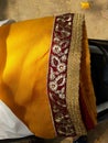Indean yellow sari with nice border Royalty Free Stock Photo