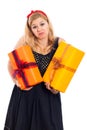 Indecisive woman with two gifts Royalty Free Stock Photo