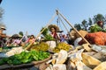 Indein, Myanmar - March 2019: Burmese woman sells vegetables on the street market