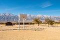 Basketball basket and one of the barracks of the remains of the Nikkei concentration camp of Manzanar in Independence