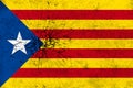 Independence Catalonia Flag on Cracked wall texture background.