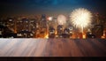 Independence Day Fireworks Illuminate City Skyline With Celebration Wooden Table On Blurred Kitchen