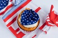 Independence day fourth of july cupcake decorated with american flag concept