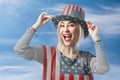 Independence Day. Happy young woman dressed in american flag clothes Independence Day. Happy young woman dressed in american flag Royalty Free Stock Photo