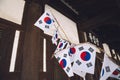 Independence Hall and Korean national flag Taegeukgi at Seodaemun Independence Park in Seoul, Korea