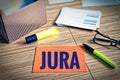 Index cards with legal issues with glasses, pen and bamboo with the german word Jura in english law Royalty Free Stock Photo