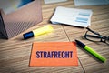 Index cards with legal issues with glasses, pen and bamboo with the german word Strafrecht in english criminal law Royalty Free Stock Photo