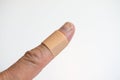 Index finger with band aid