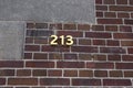 Index with the number 213 on the facade Royalty Free Stock Photo