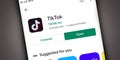 TikTok App icon on mobile screen with uninstall and open button at play store