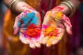 India Closeup of Hands of a Girl with colours during the celebration of Holi, festival celebration