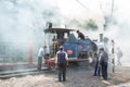 INDIA, DARJEELING. Locomotive of historic steam train being prepared for departure in Ghoom