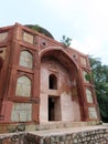 India, Delhi, ancient mausoleum in a tropical park