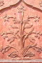 India, Delhi, Mar 30 2019 - Detail, Islamic bas relief decoration on red sandstone of entry gate, Lal Qila or Red Fort