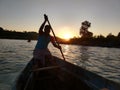 Sunset at Chitrakut with the helmsman silhouetted during the sunset