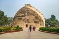 INDIA. Family in front of historic granary in Patna