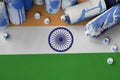 India flag and few used aerosol spray cans for graffiti painting. Street art culture concept