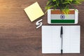 india flag on gadget, wireless headphones, notebook for writing new words, place for text, Royalty Free Stock Photo