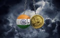 India flag smashing into a gold bitcoin crypto coin. 3D Rendering