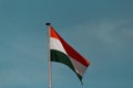 India flag waving in the blue sky