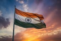 India flag waving in the wind against blue and orange sunset sky, Tricolor Indian Flag during Sunset and beautiful sky, AI Royalty Free Stock Photo