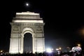 India Gate decorated in glow of night lights moon above the India Gate Delhi unidentified people and tourists 2 Dec 2017 Delhi Royalty Free Stock Photo
