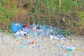 India, Goa, February 05, 2018. Empty plastic and glass bottles lie on the beach and pollute the ecology of the sea Royalty Free Stock Photo