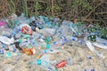 India, Goa, February 05, 2018. Empty plastic and glass bottles lie on the beach and pollute the ecology of the sea Royalty Free Stock Photo