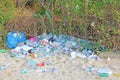 India, Goa, February 05, 2018. Empty plastic and glass bottles lie on the beach and pollute the ecology of the sea Royalty Free Stock Photo
