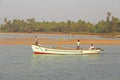 India, GOA, January 19, 2018. Fishermen on boats go to sea. Fishermen in boats are fishing and swimming along the river against