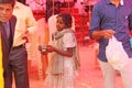 India, GOA, January 28, 2018. Poor child asks money from passers-by, child with outstretched hand, beggar. Poverty in India