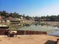 India. Gokarna. Sacred cow at a sacred reservoir Royalty Free Stock Photo