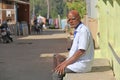 India, Hampi, February 2, 2018. An elderly Indian man, an old man with large white or gray eyebrows, sits. He wiped a man who was