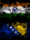 India, Indian vs Bosnia and Herzegovina, Bosnian, Herzegovinian smoky mystic flags placed side by side. Thick colored silky